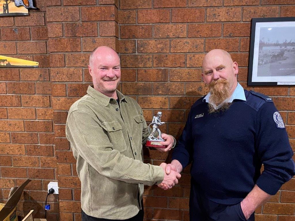 The 2022 Captain’s Appreciation Award is presented to Tim Bessell-Browne by Mirboo North CFA Captain Dave Smith.