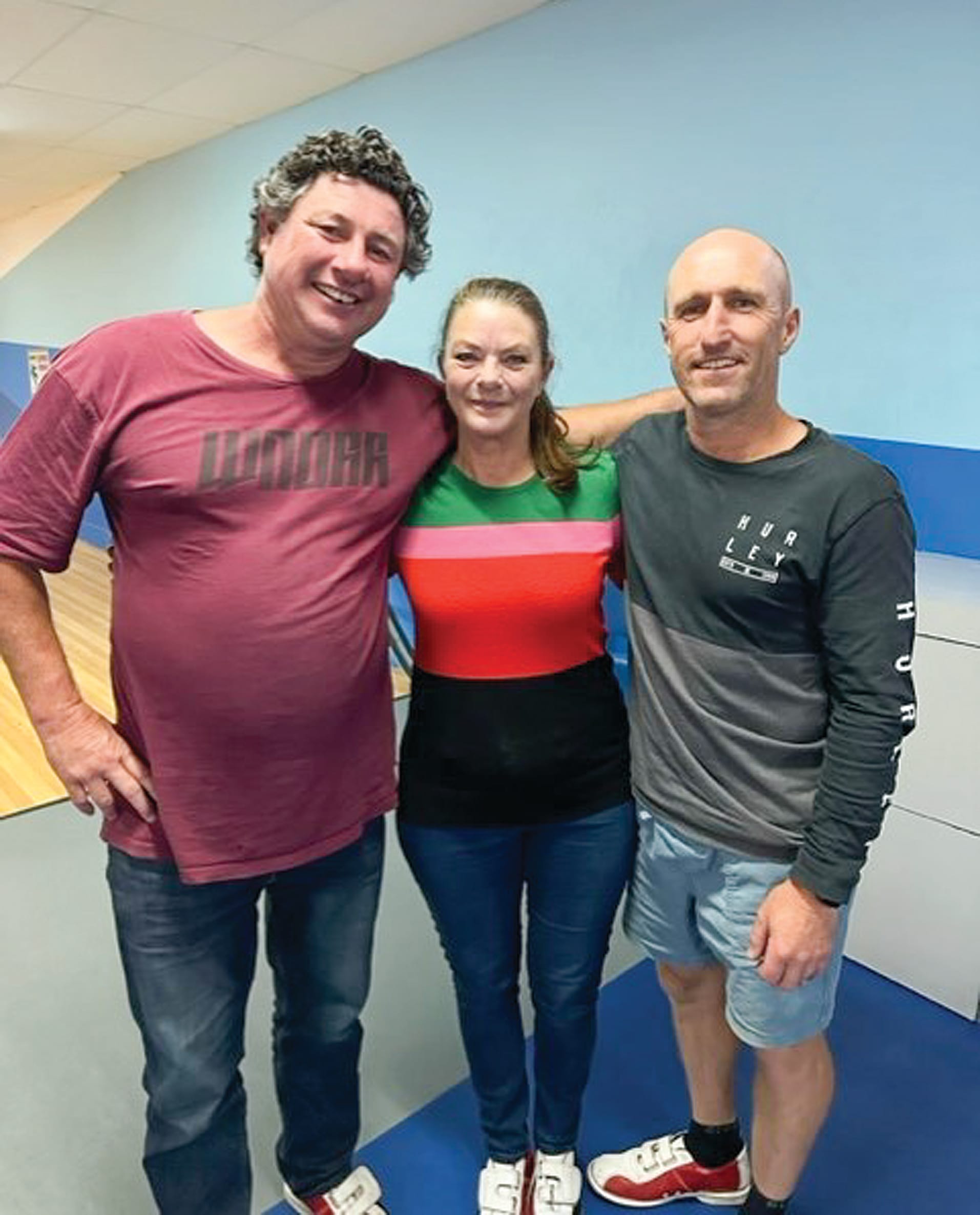 In second place for Thursday Business League, from the left, are Johnny, Kerri and Troy.