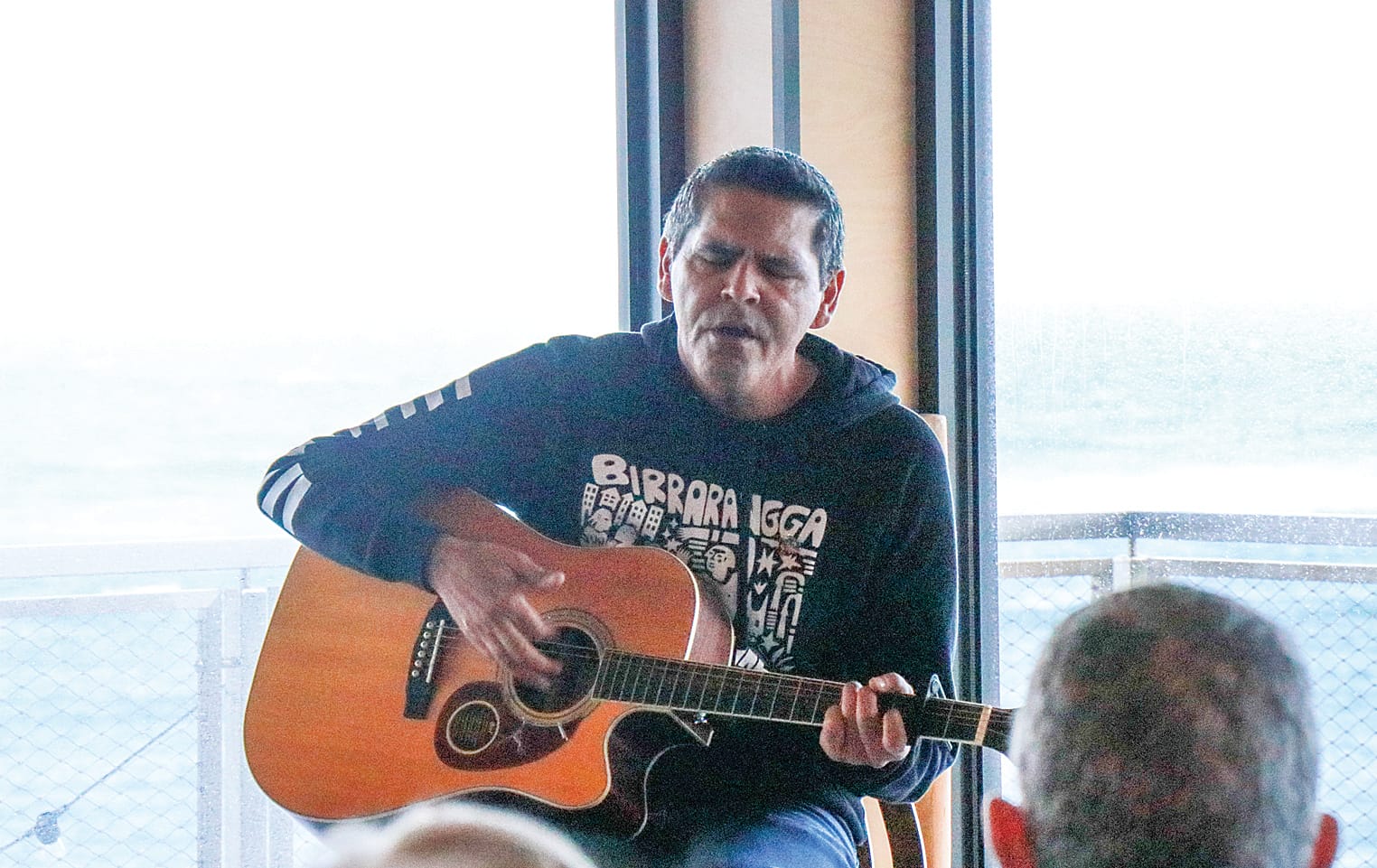 Singer and guitarist Paul Patten performed ‘Strong Black Woman’ at the National Sorry Day gathering in Cape Paterson on Friday morning. Z04_2223 