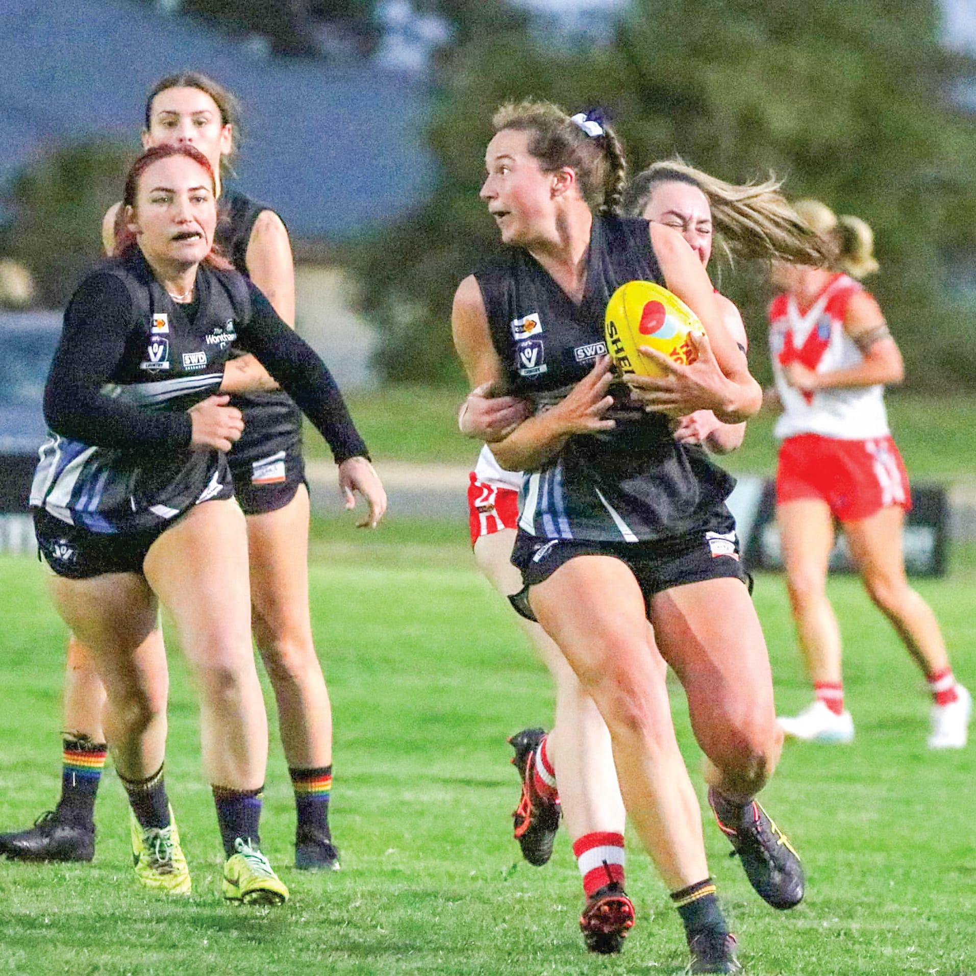 Sophie McCracken-Evans breaks away from a tackle.