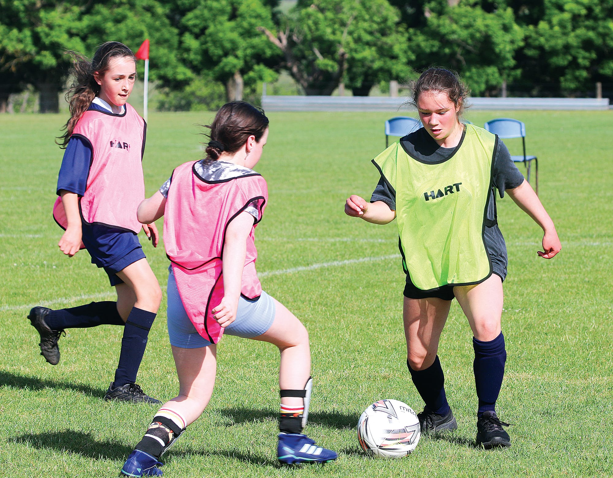 Ruby Sampson moves to get to the ball first.