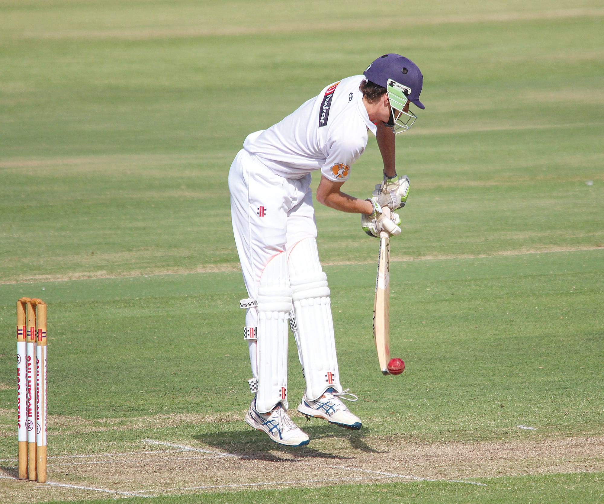 Inverloch’s Harry Butcher gets behind a quick one from Mudassar Riaz. 