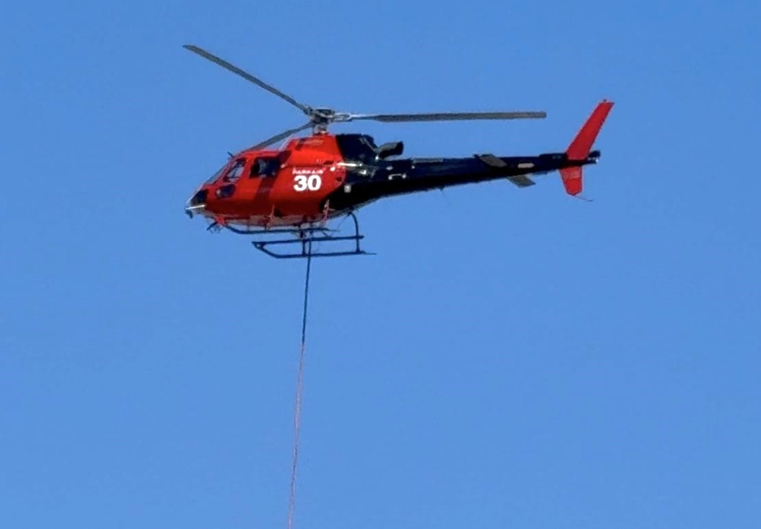 Helicopter flies for stage 2 of Forrest Caves project