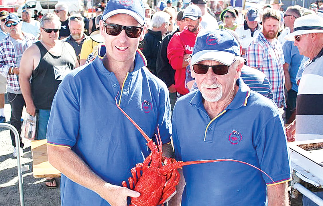 Stalwarts of the annual Kilcunda Lobster Festival, Jy Hart and Terry Miller partake in the community event on Kilcunda foreshore. 
