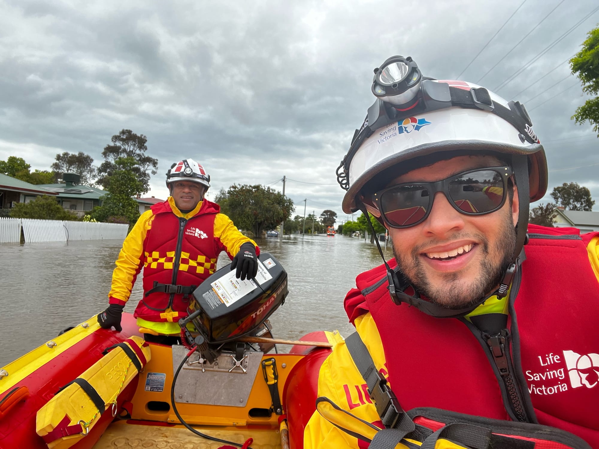 Nicholas and Sumith spent almost six hours on a lifesaving boat undertaking welfare checks on residents who chose to stay despite the flooding.
