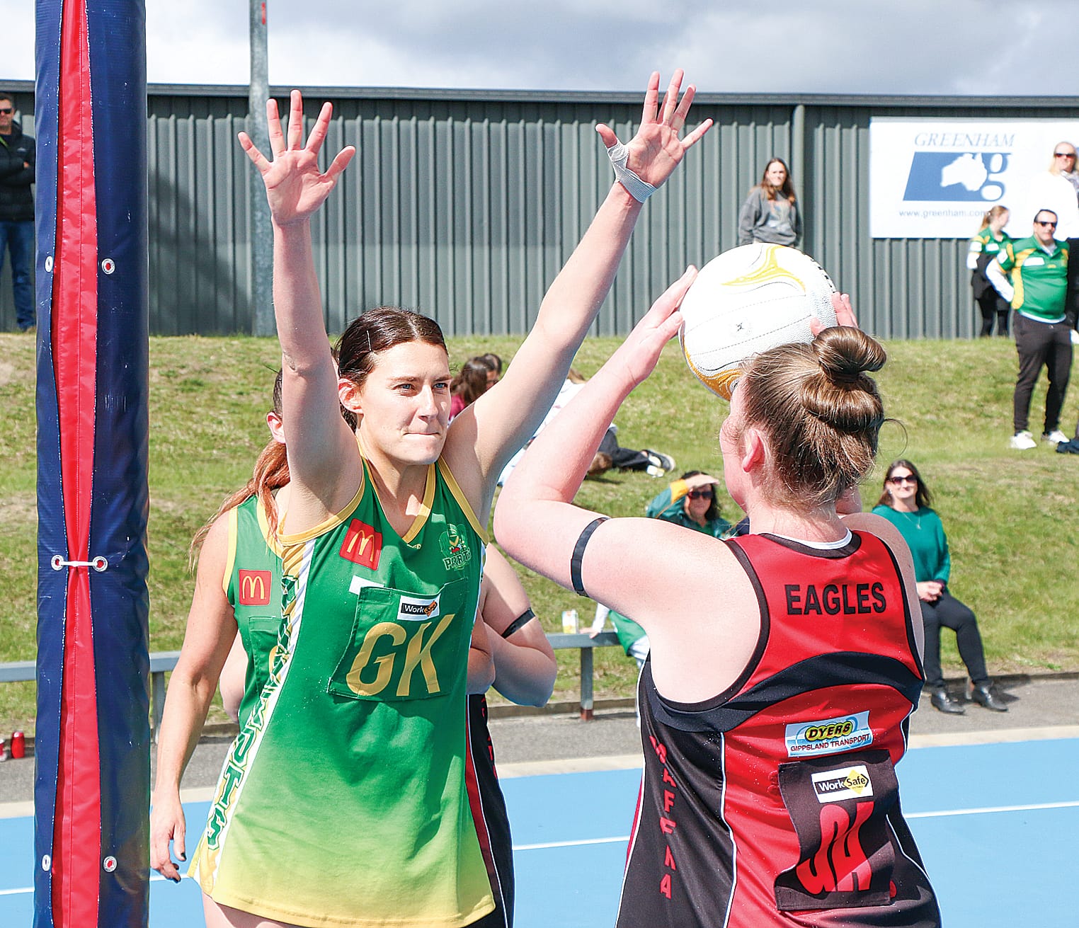 Leongatha keeper Ash Payne gets into the face of her Maffra opponent during a thrilling C Grade semi-final at Moe on Saturday.