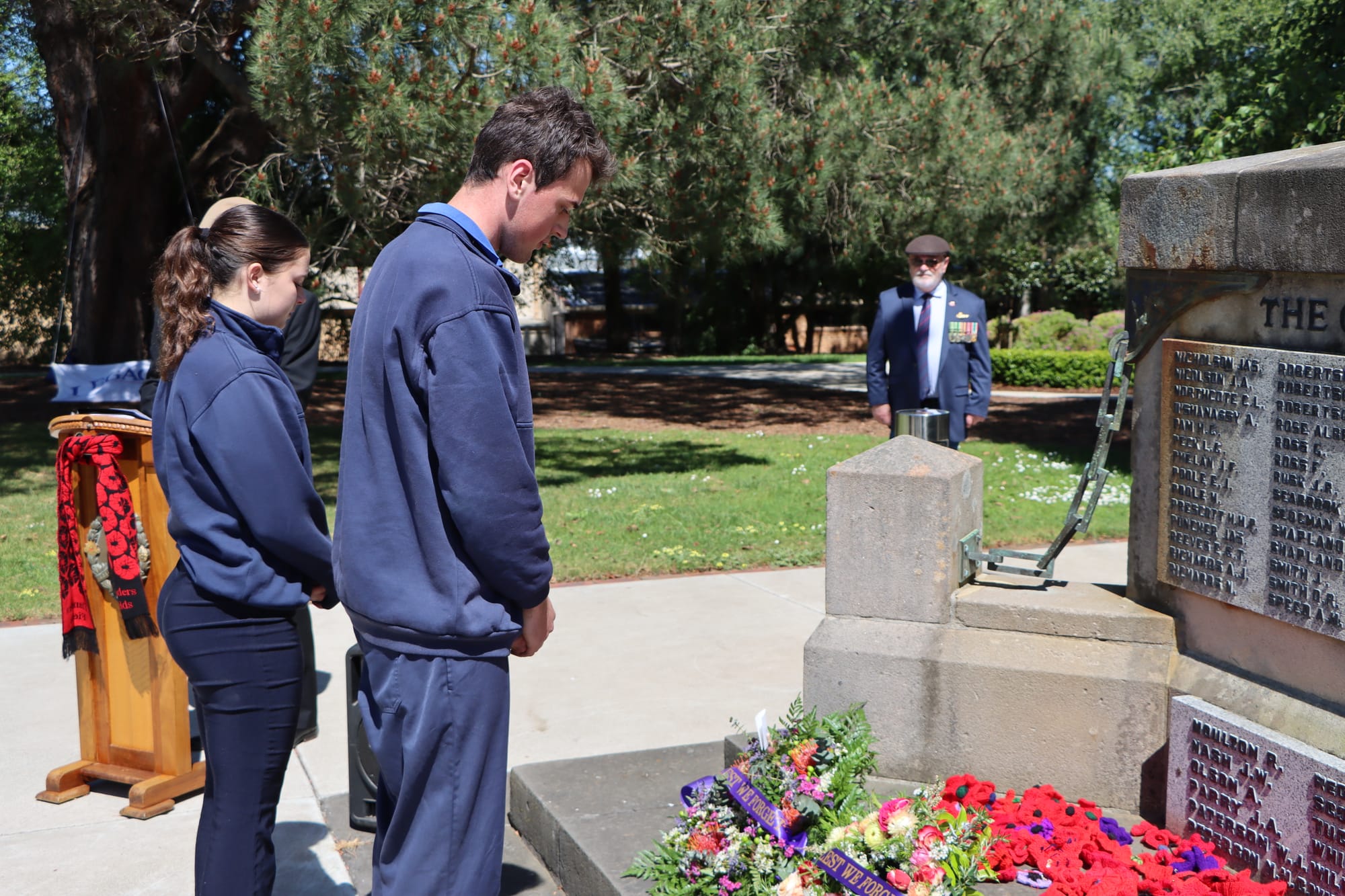 A couple of next year’s Korumburra Secondary College captains Kiera Witton and Riley McIntosh pay their respects during the wreath laying.

