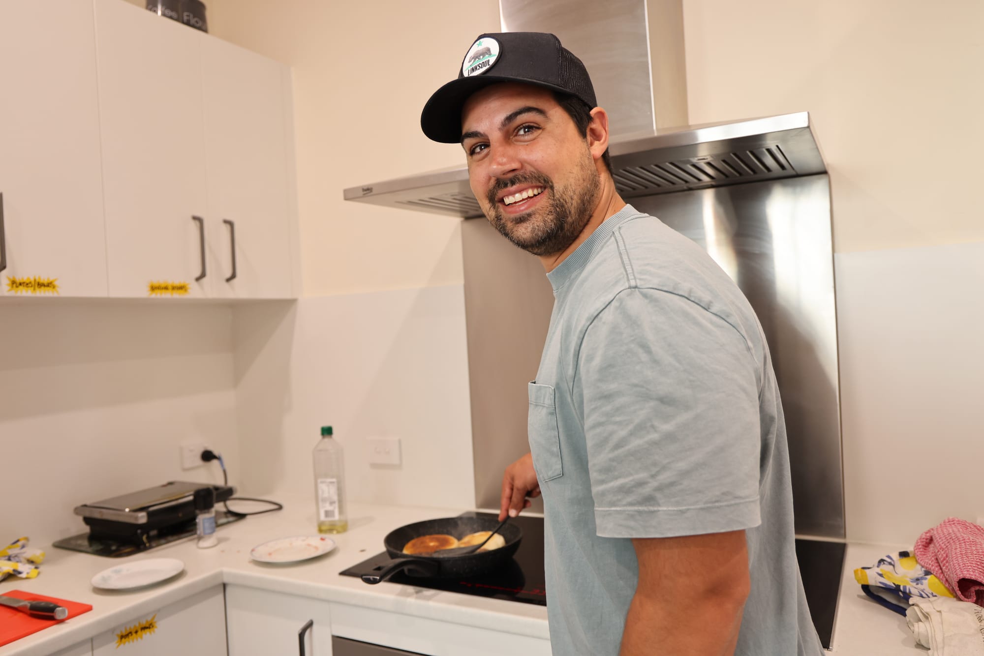 Anglicare Youth Facilitator Raf Casero cooking up a storm as part of YouthFoodz program at the YES Youth Hub in Wonthaggi. B11_4425