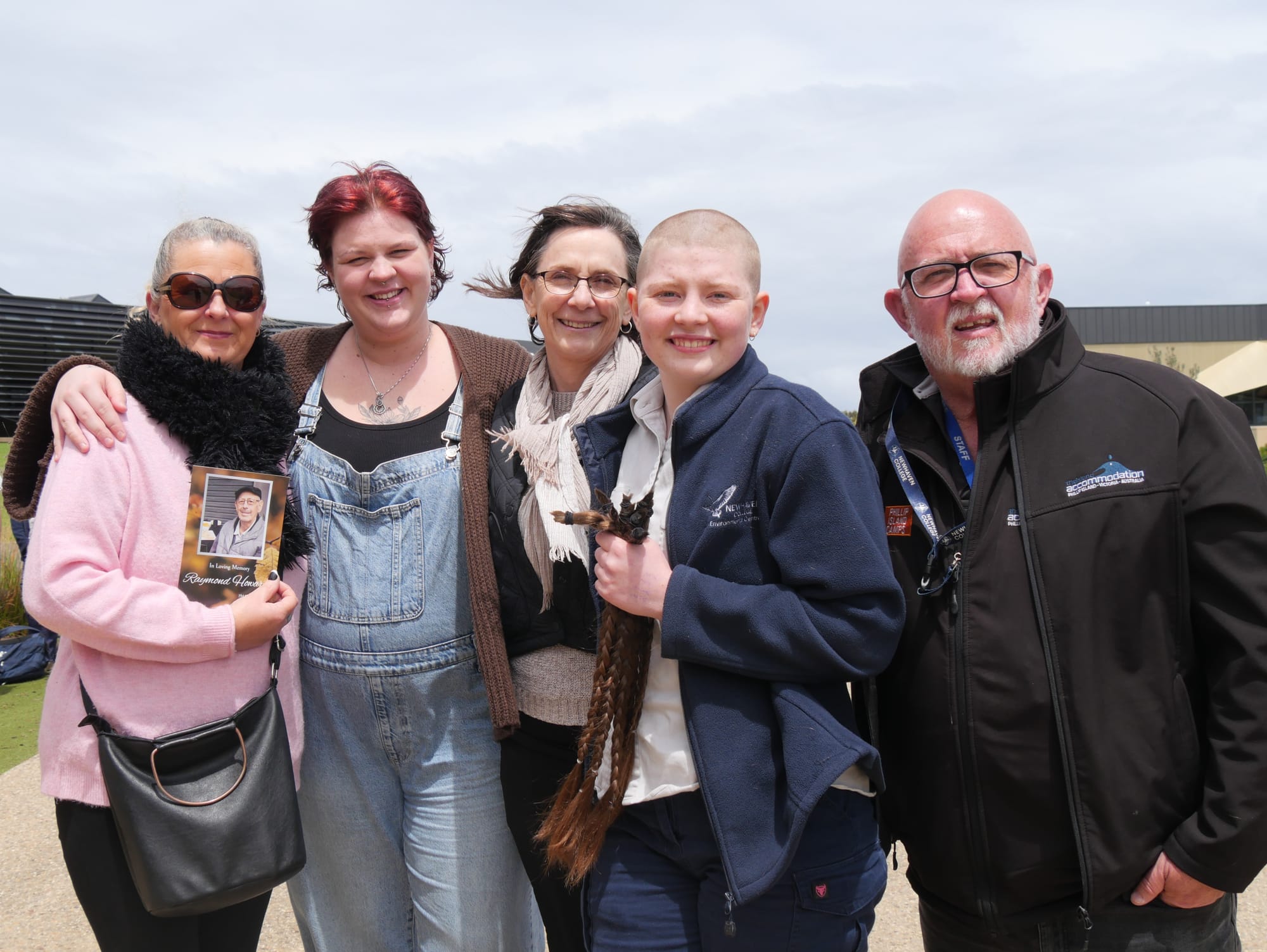 Newhaven College Year 9 student Georgia Sanders shows off her ‘Brave Shave’ – raising funds for the Australian Cancer Research Foundation, pictured with Colleen Howard, Chloe Kidders from Elements Hair Room, Georgia’s mum Fiona King-Drummond and Stepdad Ed Drummond.