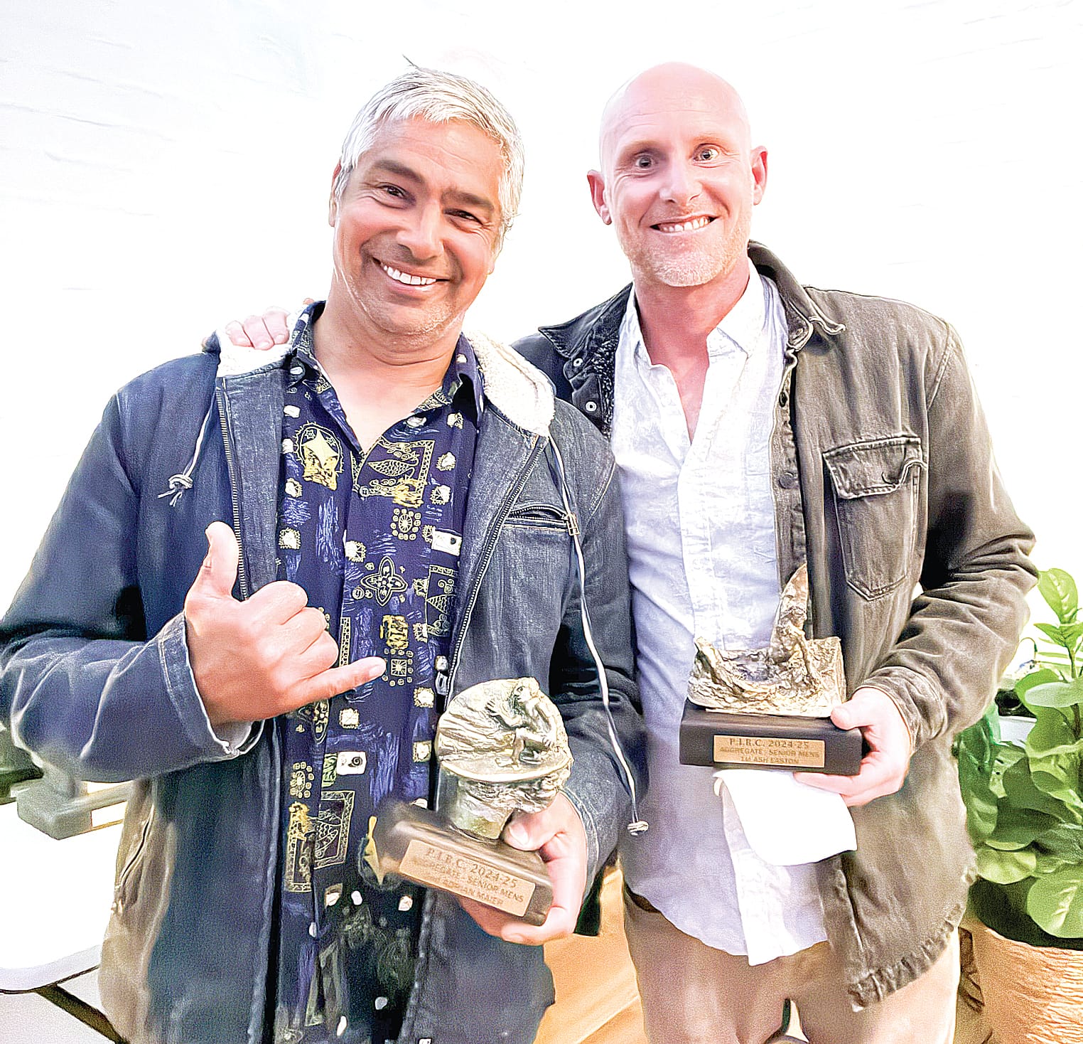 Masters winner Adrian Maier and senior men’s winner Ash Easton. 