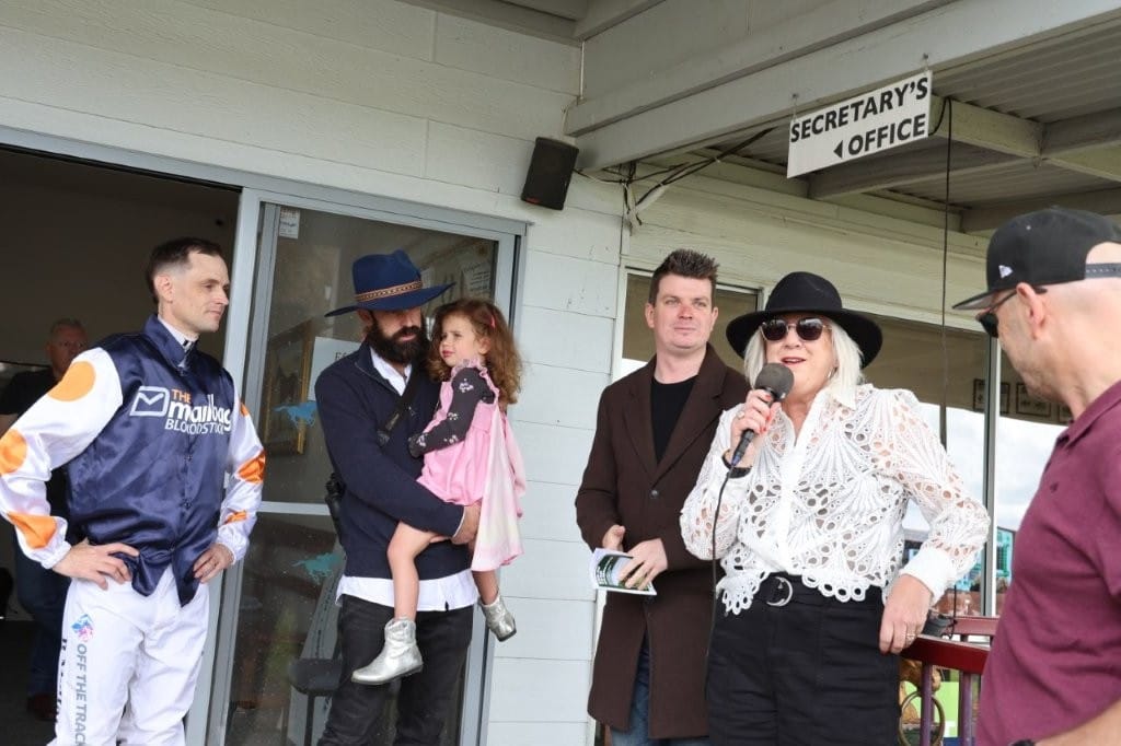 Wife of the late Rodney Hee, Nicole Hee, addresses family and friends after Race 2 at Woolamai on Saturday, an event sponsored by the Hee family in memory of the keen racegoer who died last November aged 54.