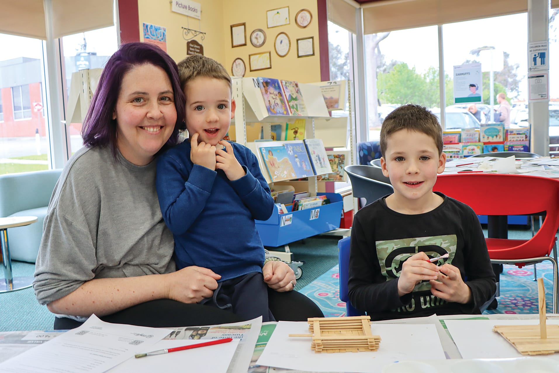 Eliza, Ryder and Darcy Cholmondeley love library activities during the school holiday period. A04_4025