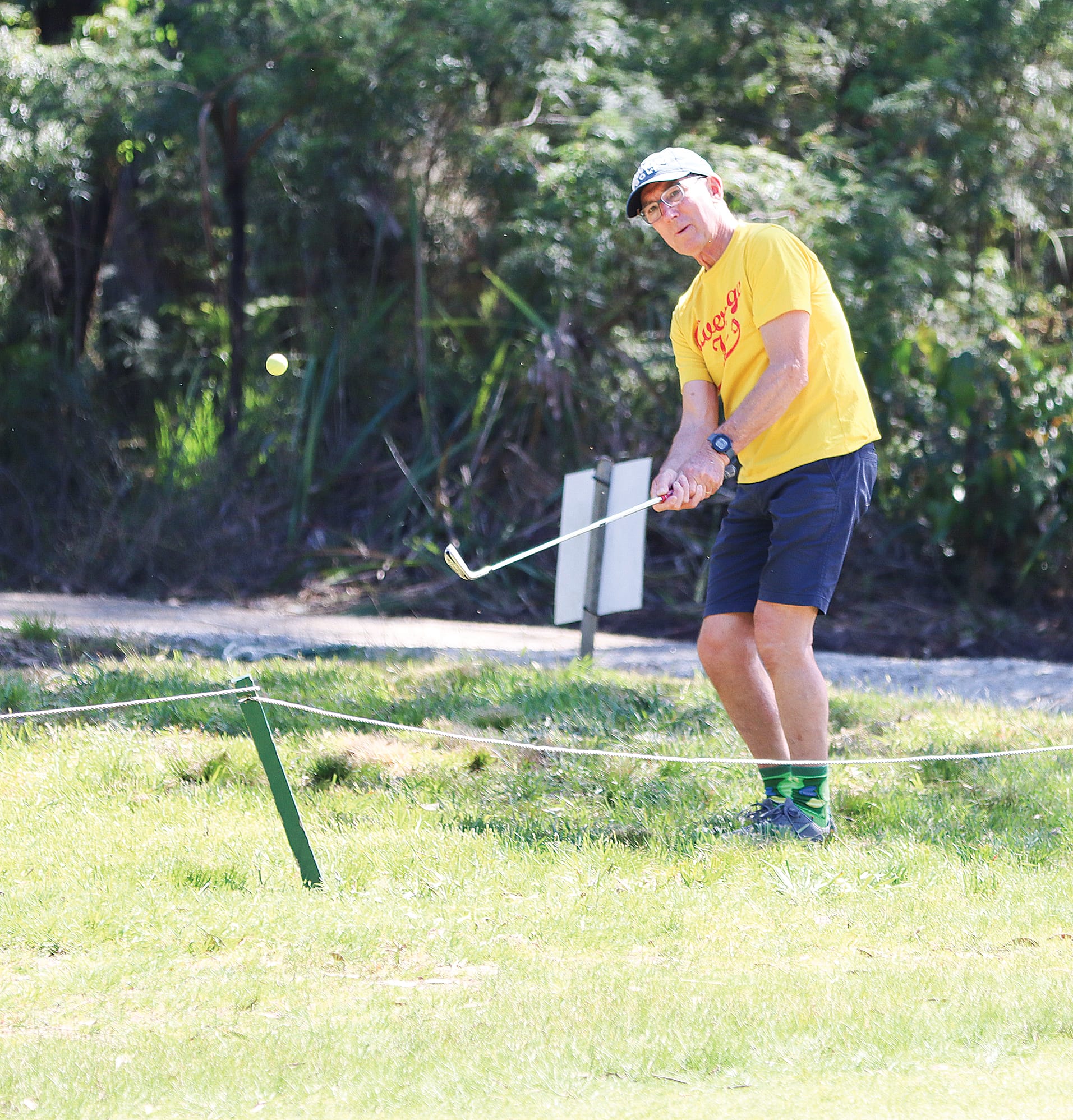 Russell Hodgson chips on the 10th hole. A11_4425