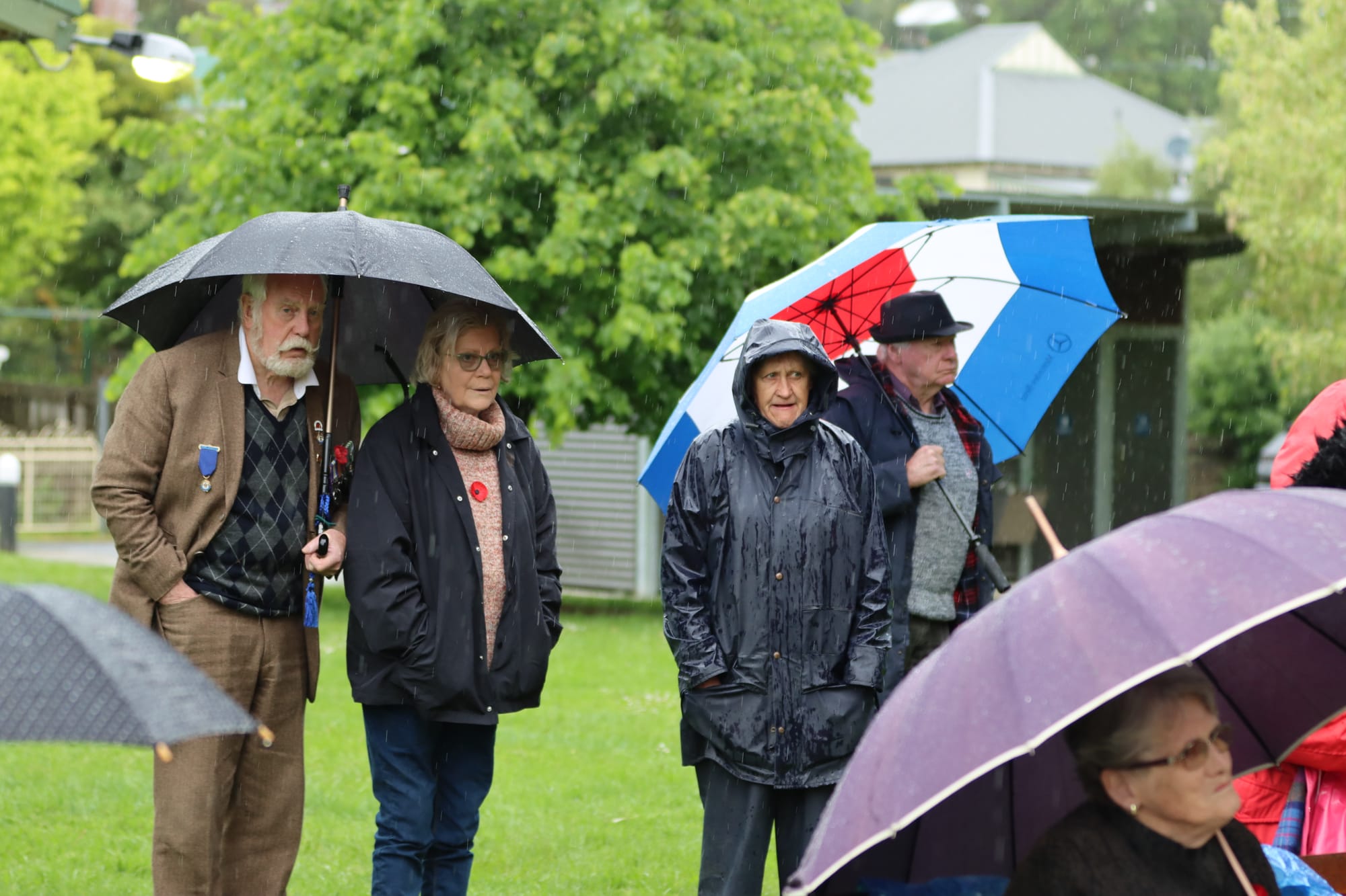 People pay their respects at the Korumburra Cenotaph.
