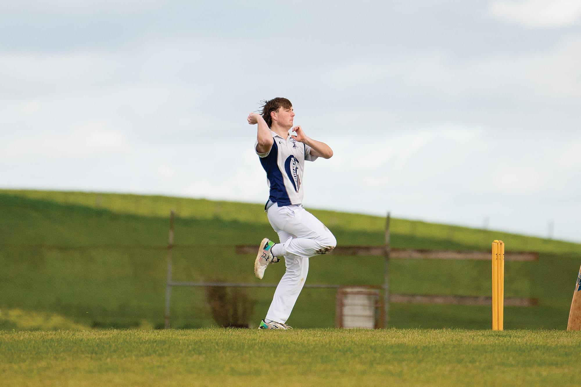Korumburra’s Jayden Douglas bowling in the Under 17’s win against Inverloch. Photo: Linda Jefferis. 