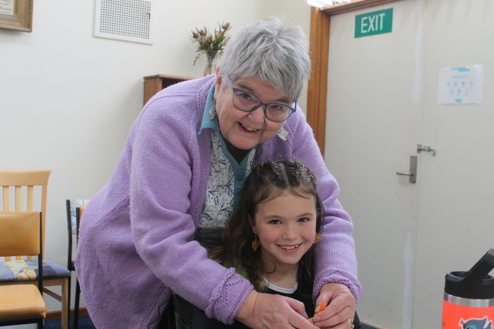 Community knitters spin yarns and knit blankets for the homeless