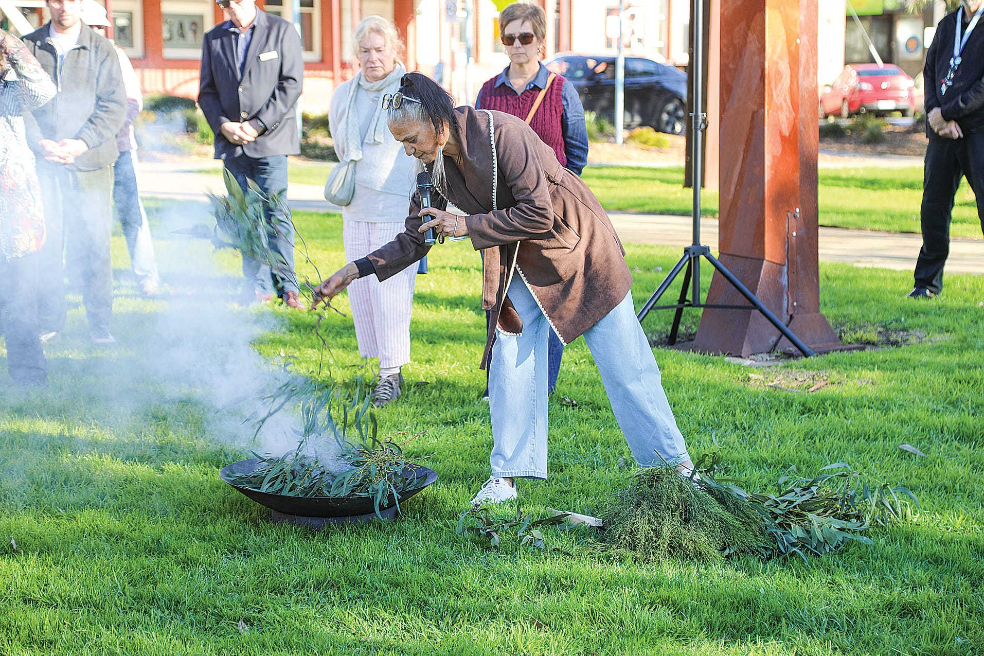 Bunurong elder Sonia Weston leads a smoking ceremony at Apex Park to open the Radical Women launch.