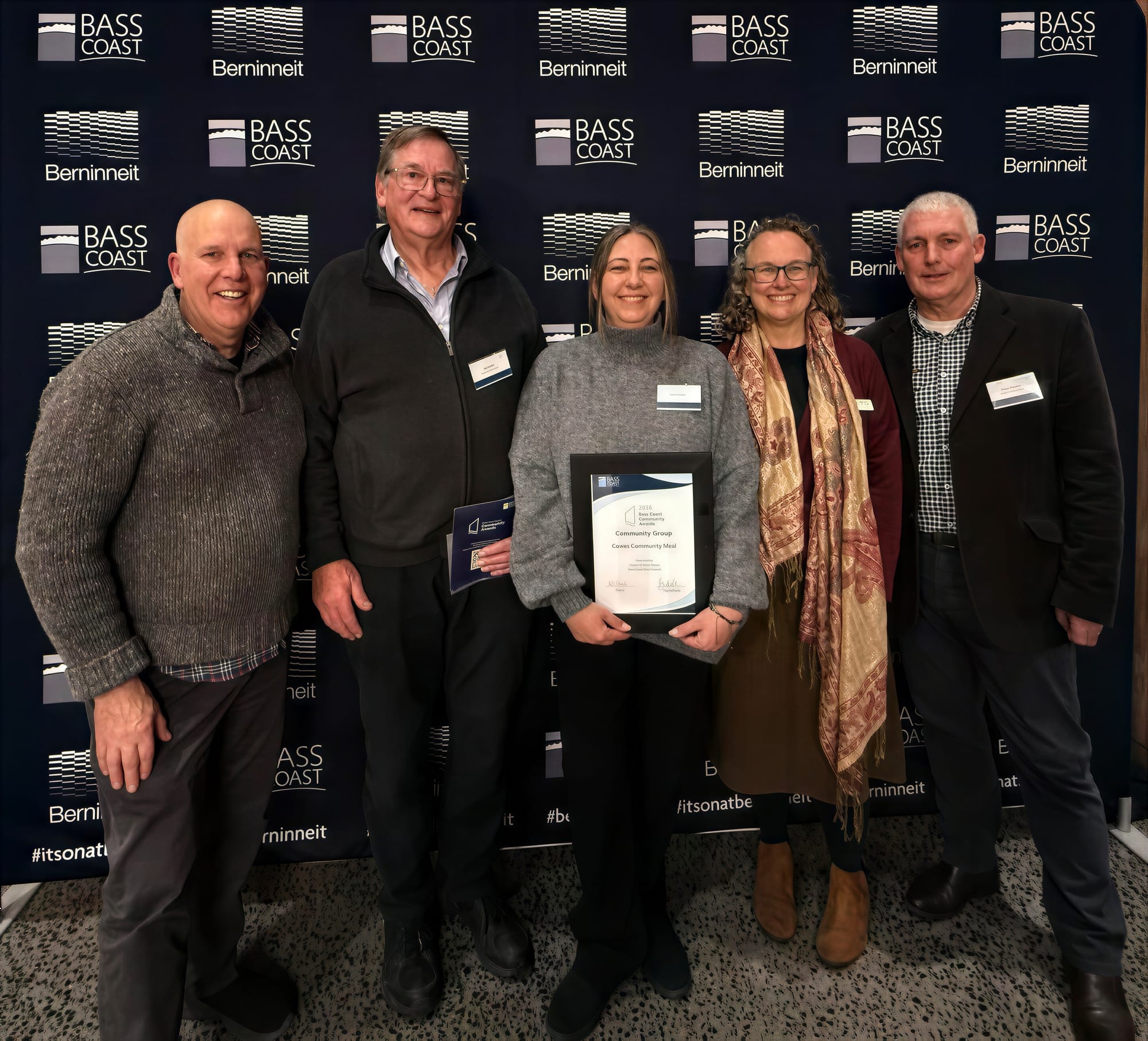 Cowes Community Meal representatives with their award