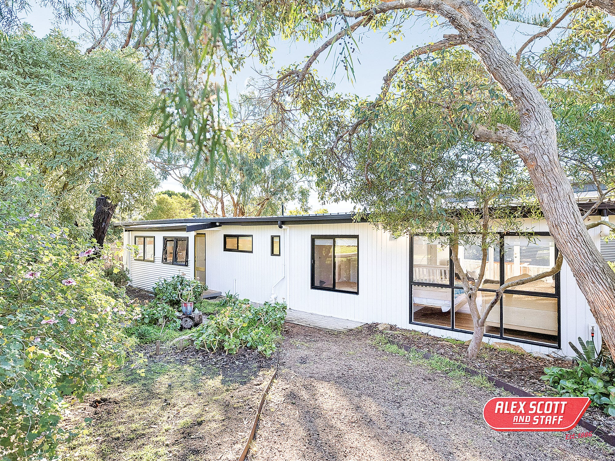 Classic Island beach house moments from the sand