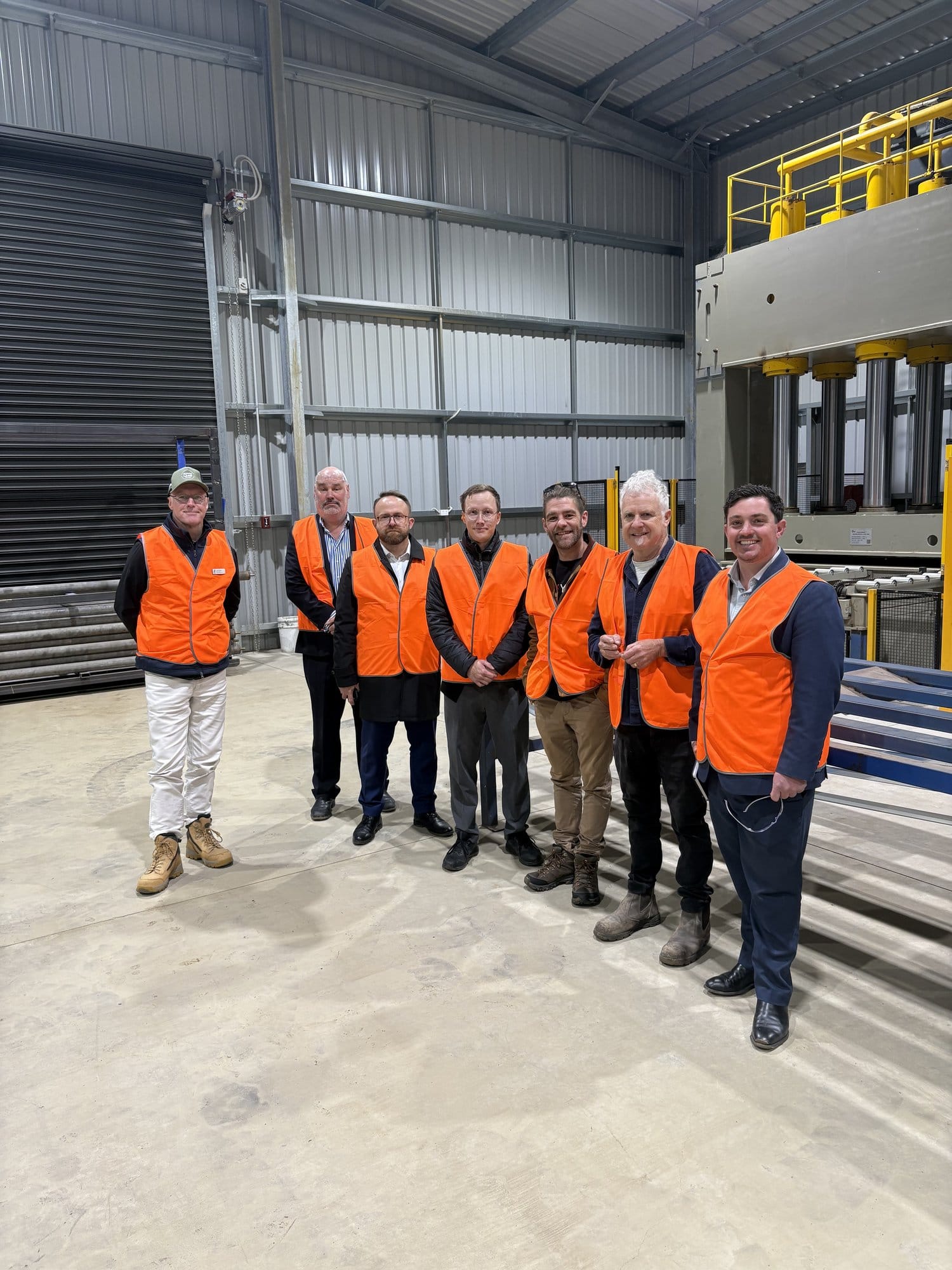 Cr Nathan Hersey, right, with South Gippsland Shire councillor Cr Scott Rae and members of the IURC delegation at Radial Timber.