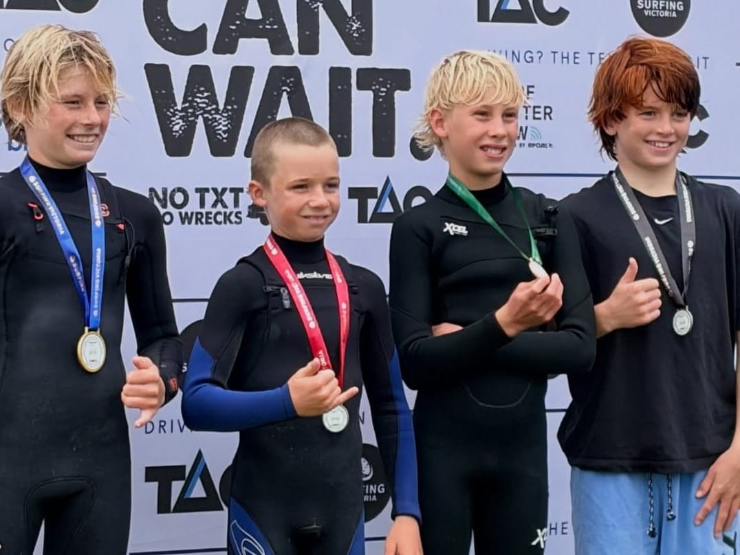 Lennox Archibald, second from right, celebrates his third-place finish at the Victorian state round at Smiths Beach in May, where he secured selection in the Victorian under-14 team.
