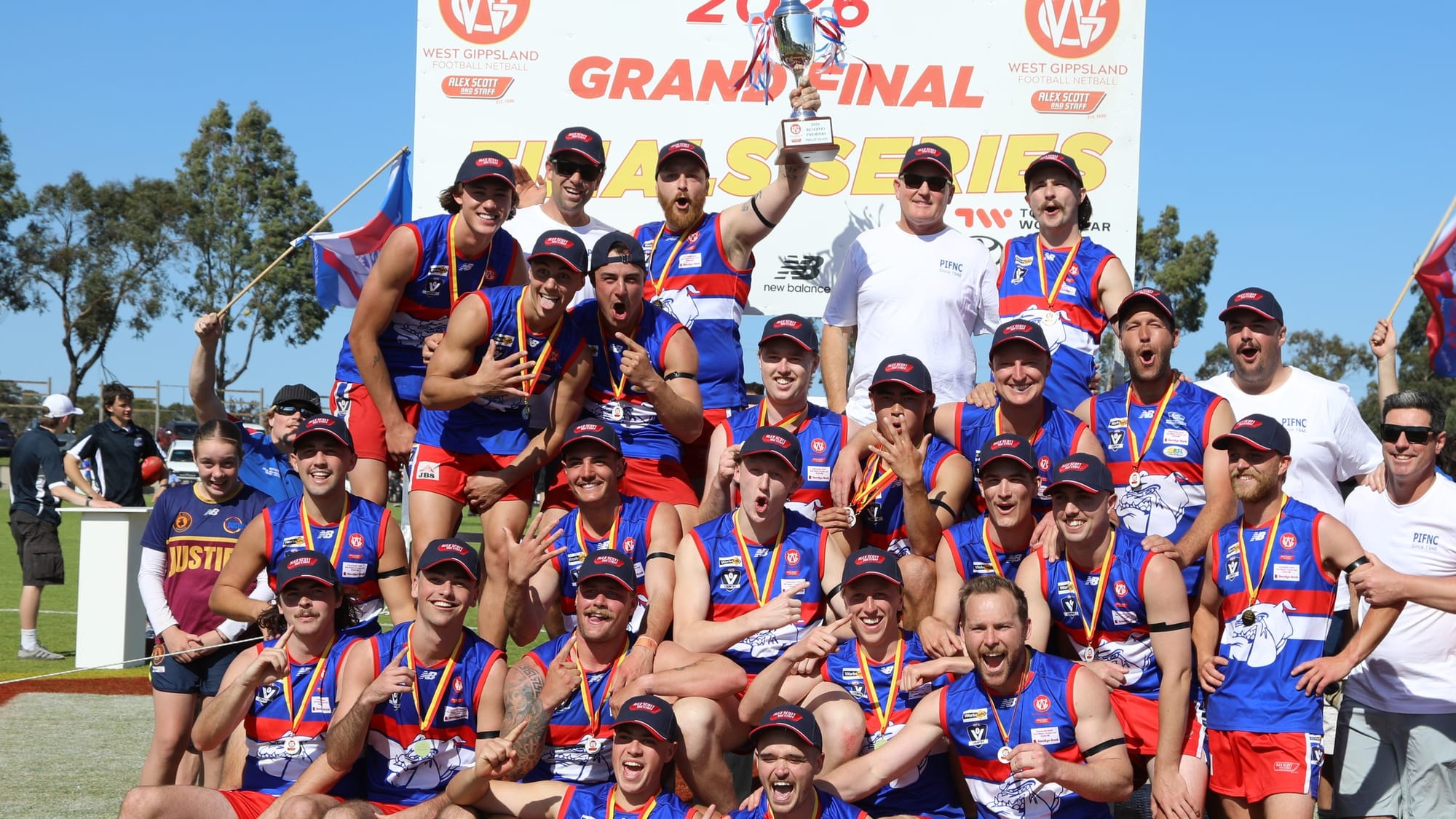 The Phillip Island reserves with the premiership cup at Garfield