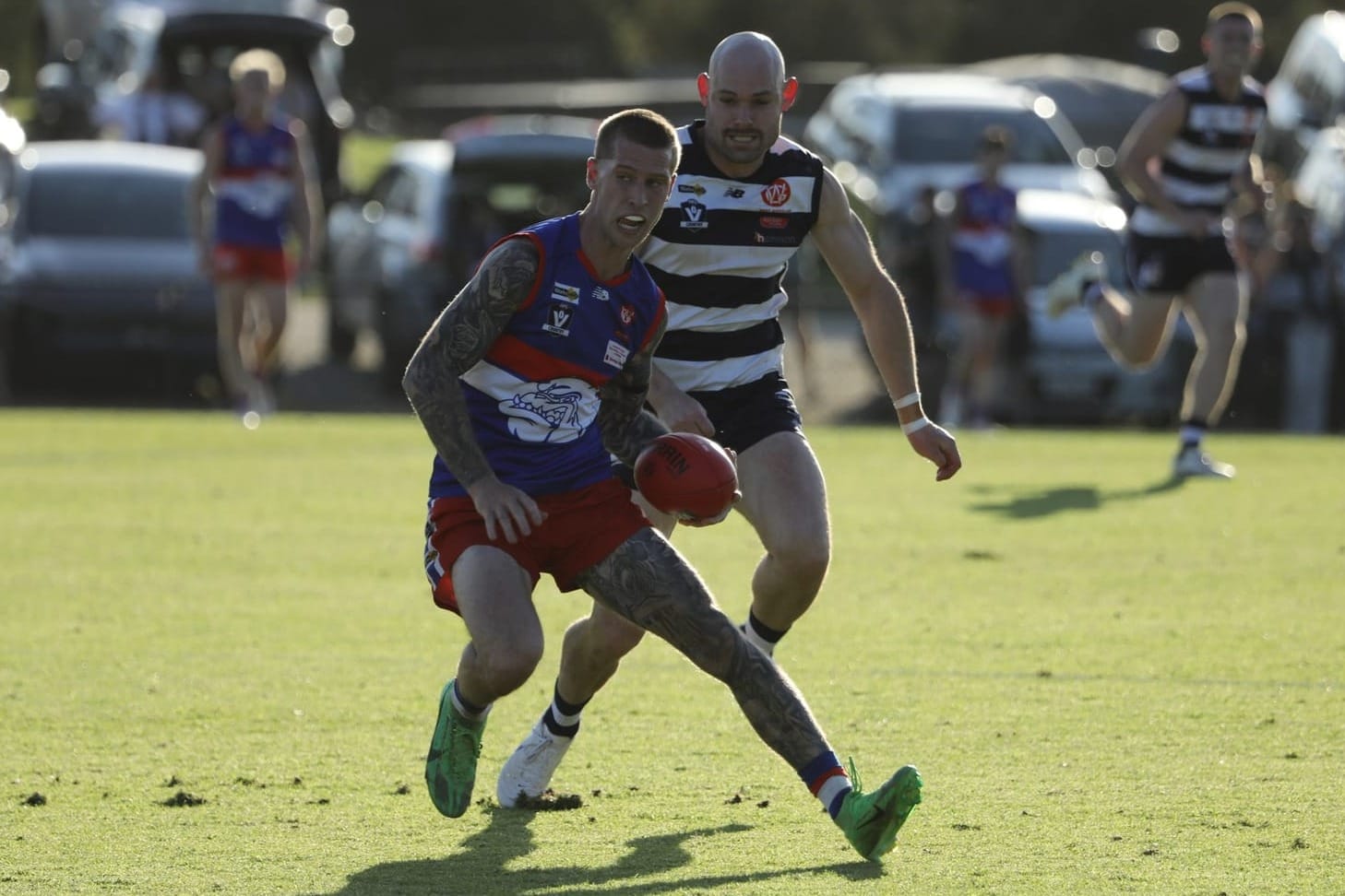 Phillip Island's Bryce Hindhaugh runs with the ball