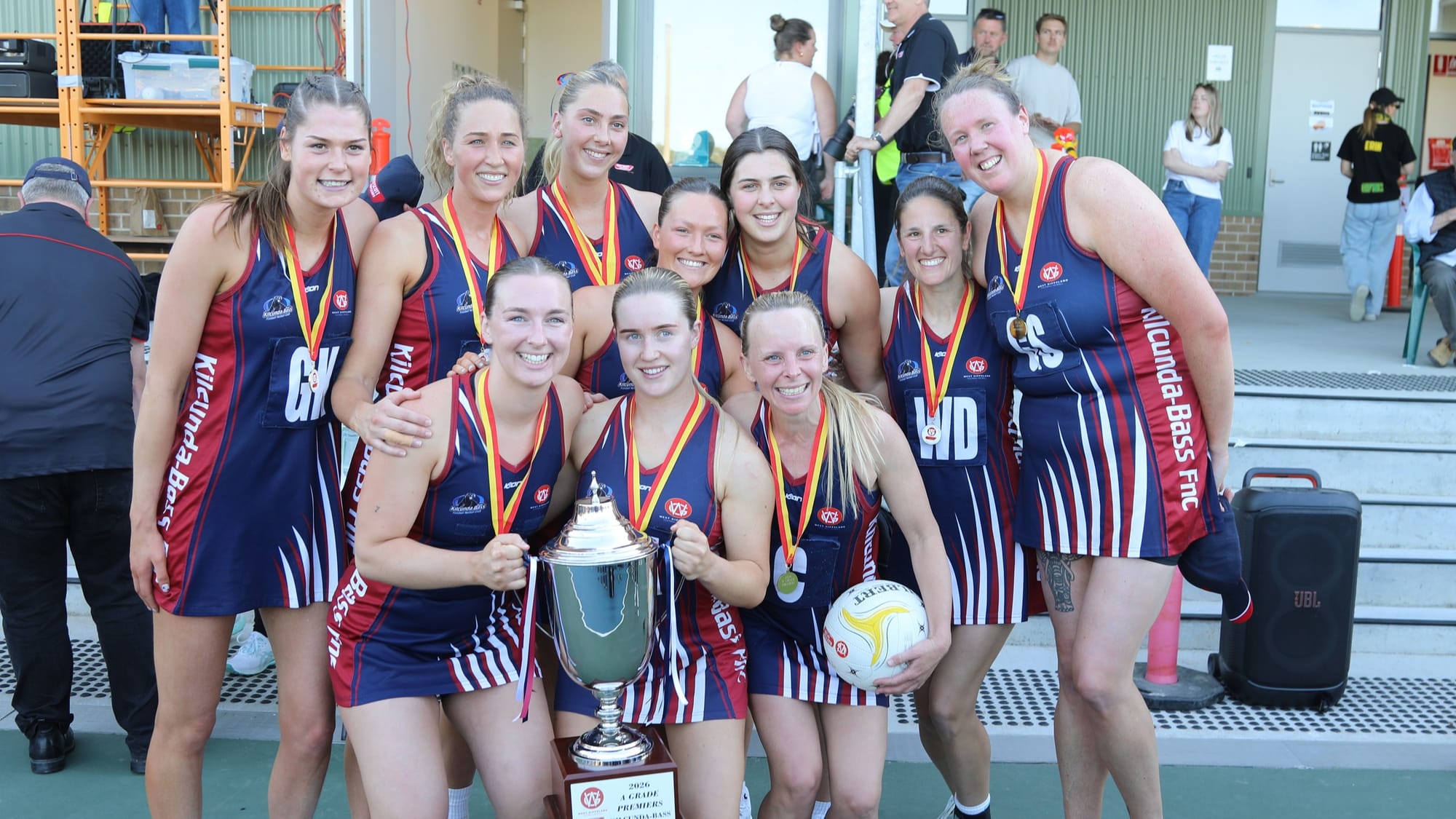The Kilcunda Bass A Grade netball side with the premiership cup