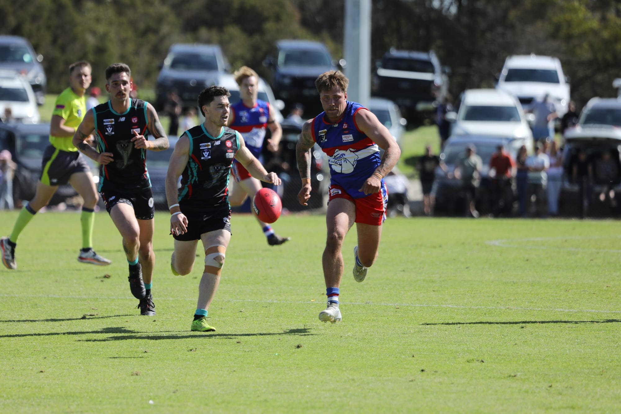 Jack Opitz chases the loose ball
