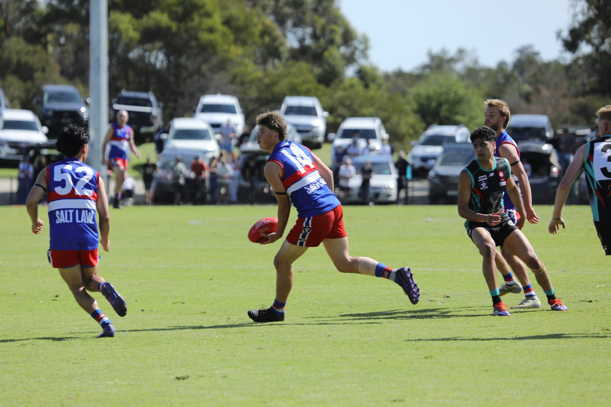 Jackson Huther looks to handball