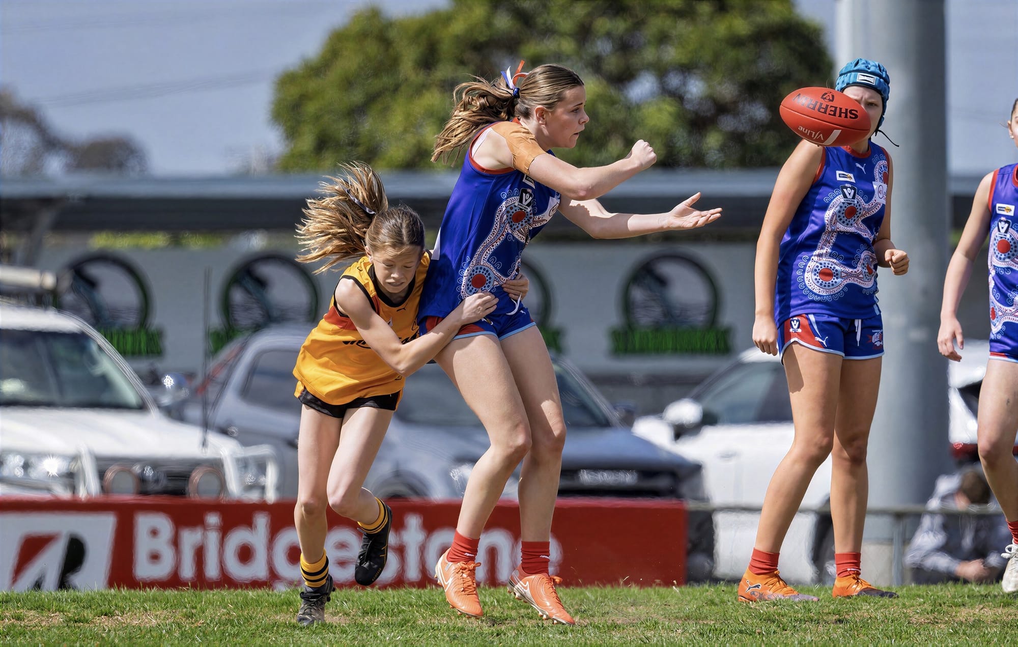 Isla Curtin gets a handball away under pressure against South East.