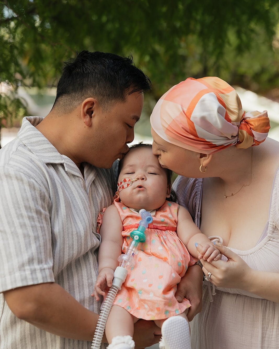 Zoe and Ken Chung with their two-year-old daughter Sophia, whose family receives support from Very Special Kids.