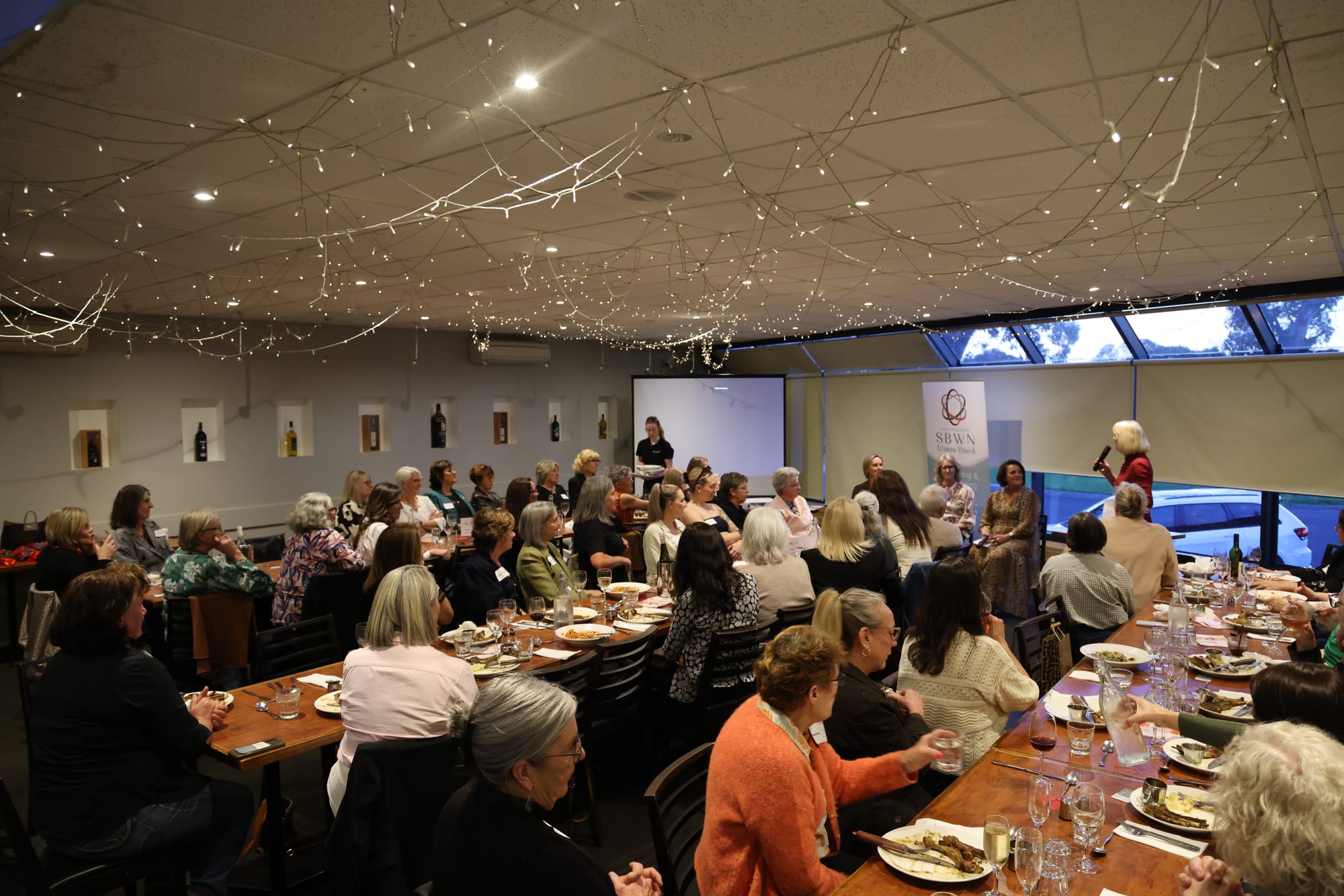 Guests listen as local mums share their experiences of raising children who have found success in sport and on stage.