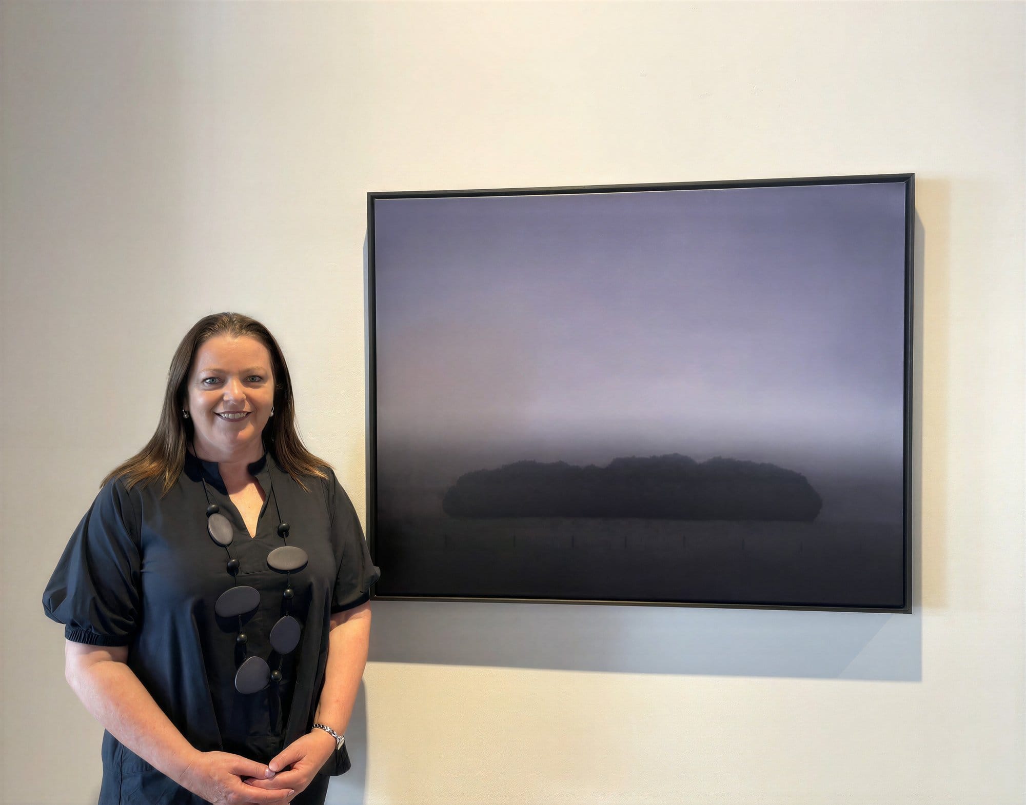 Kathryn Ryan with her oil on linen painting Beyond I.