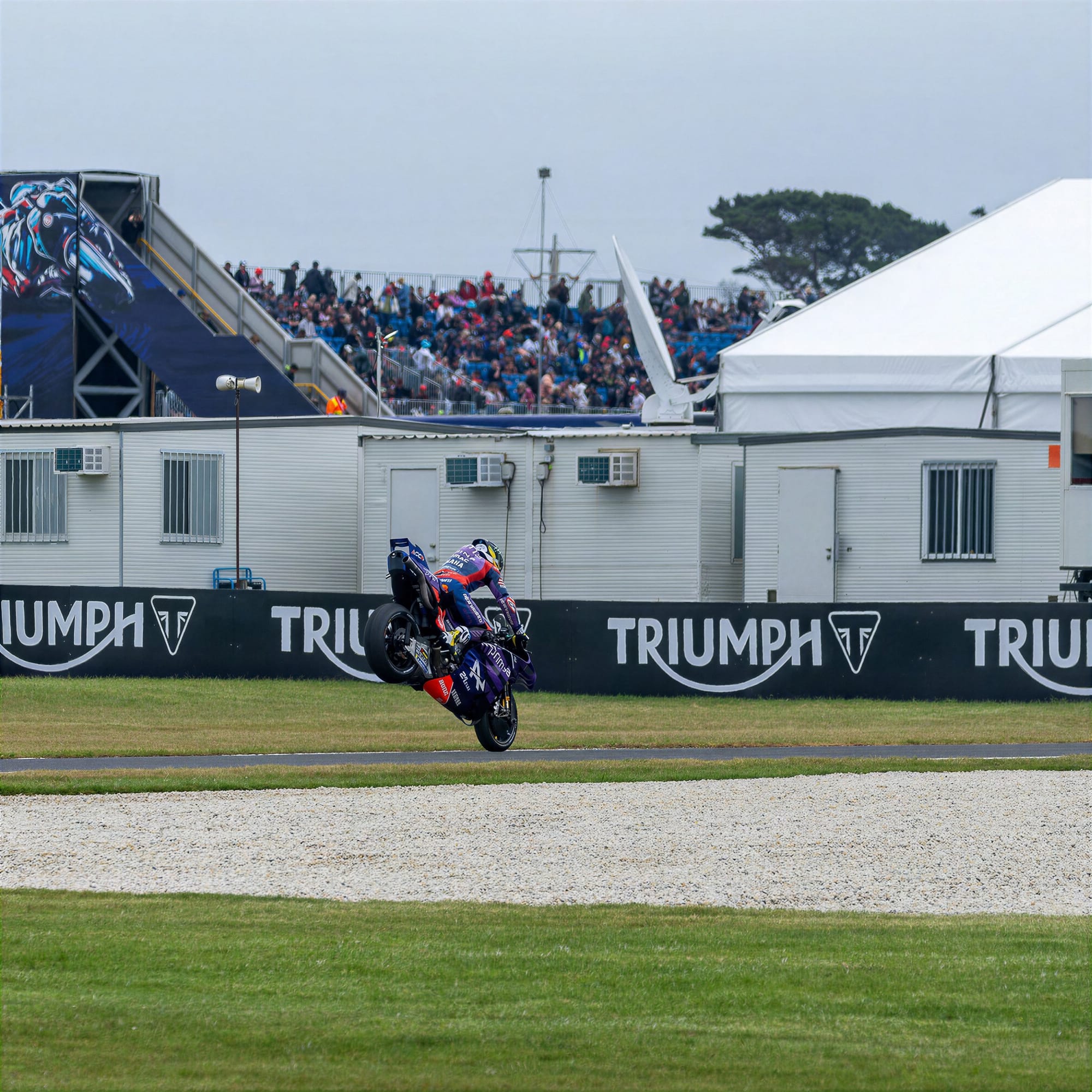 Jack Miller’s customary stoppie in front of the turn four grandstand.