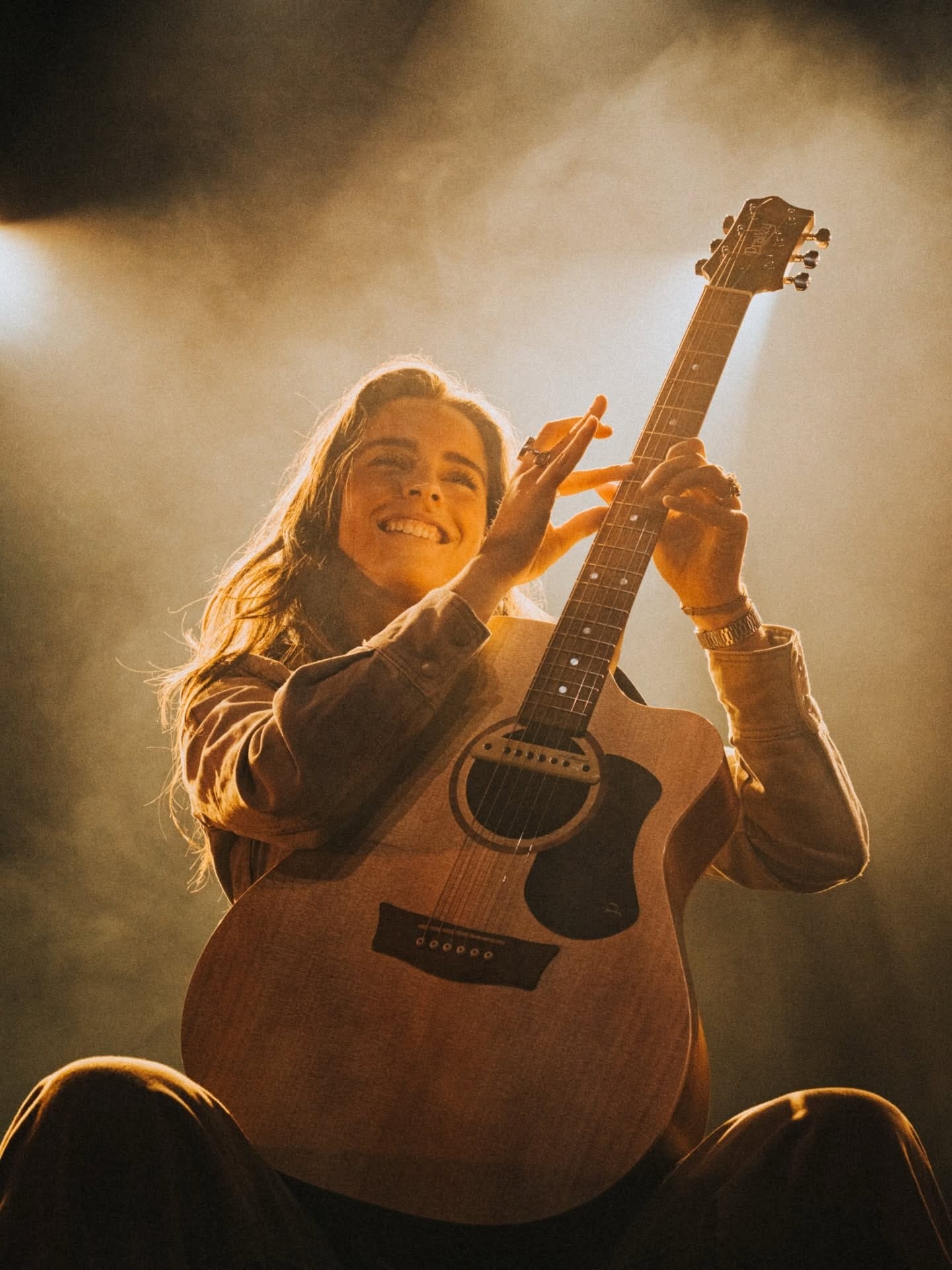 Steph Strings with her guitar