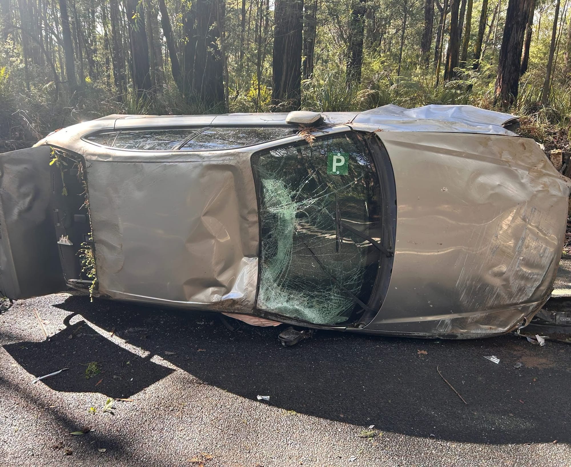 The windscreen and roof were crushed as the car rolled twice.