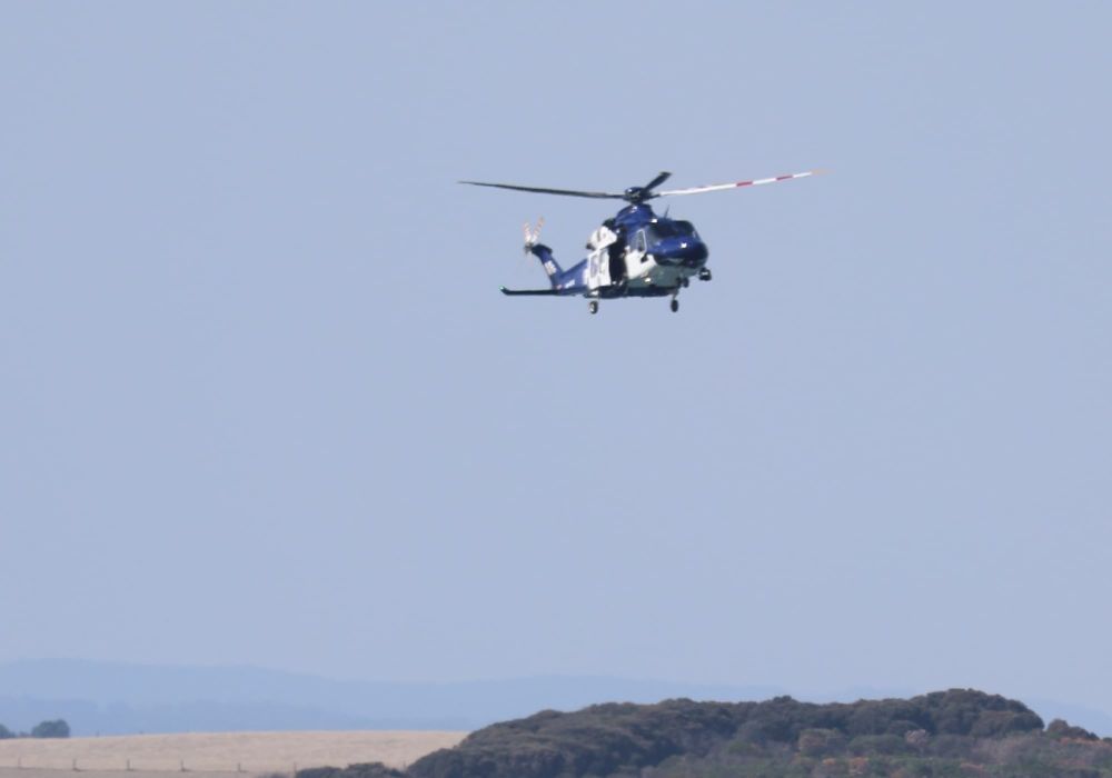 Search continues for male swept off rocks at Punch Bowl post image