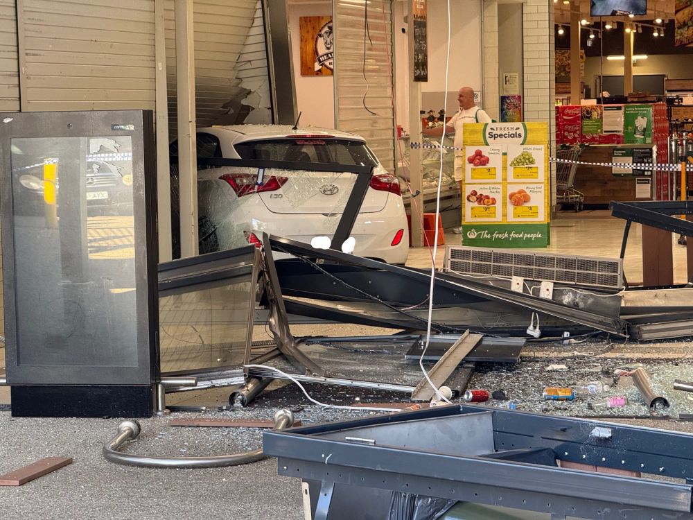 Narrow escape for Woolworths employees as car smashes through shopfront post image