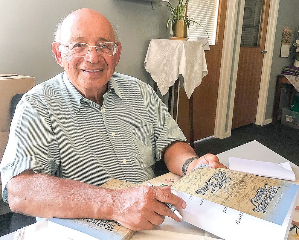 Sam Gatto researchers the mining town’s story behind the signs post image