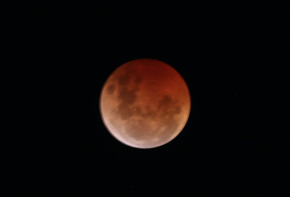 Bloody great show as moon eclipsed by earth's shadow post image