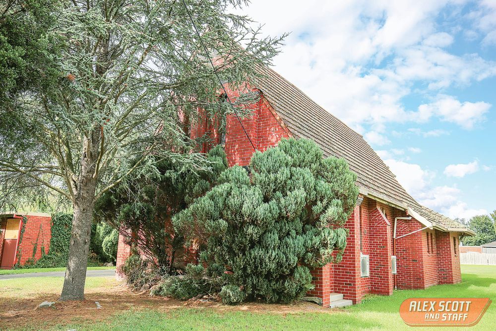 Own the historic red brick church post image