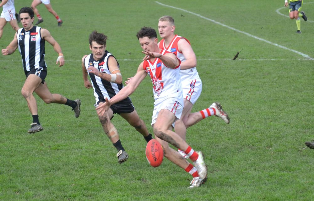 Top sides clash in tight match post image