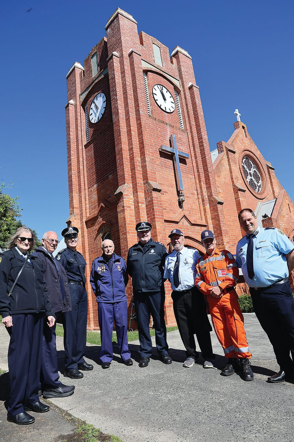 Services gather on a blue day for police post image