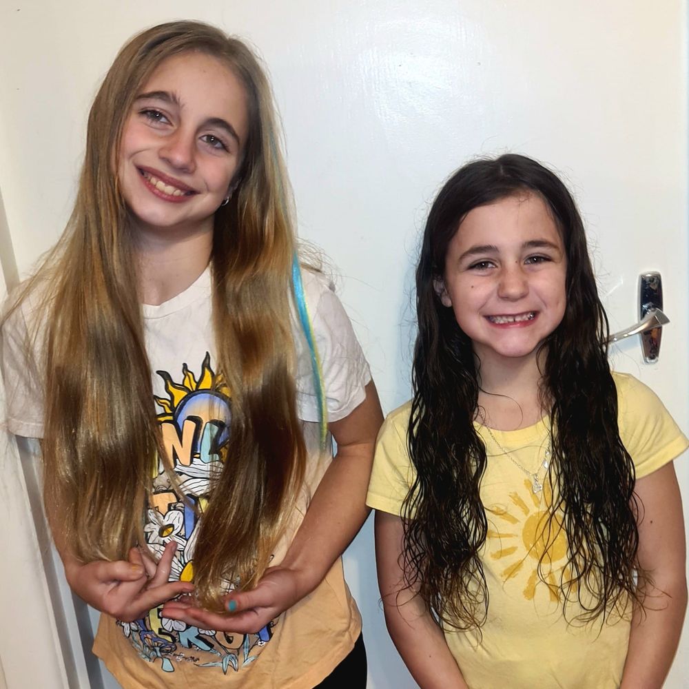 Sisters donate hair in memory of grandmother for cancer fundraiser post image