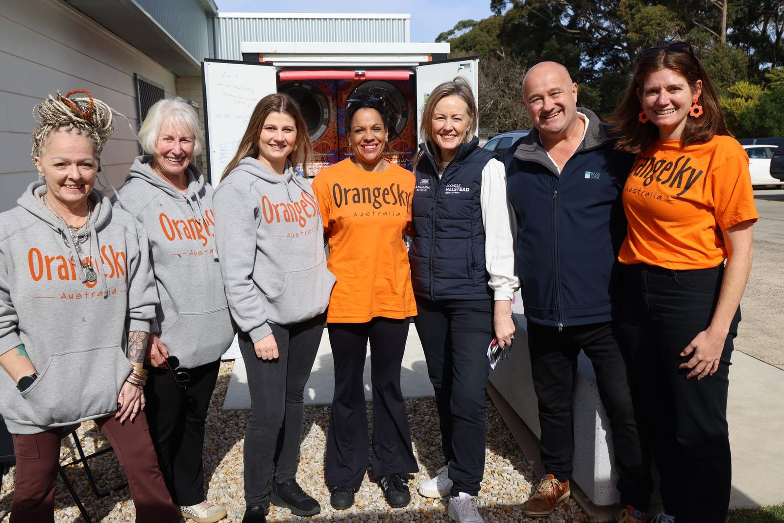 Community celebrates first year of Orange Sky laundry service post image