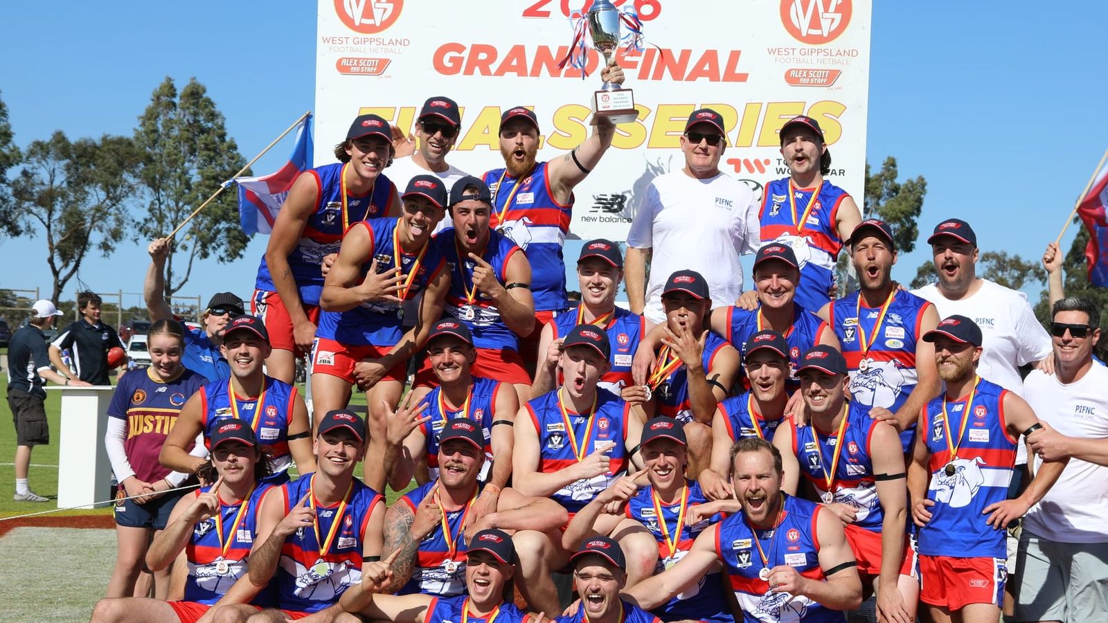 The Phillip Island reserves with the premiership cup at Garfield