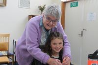 Community knitters spin yarns and knit blankets for the homeless post image