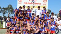 The Phillip Island reserves with the premiership cup at Garfield