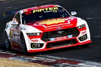 A Supercar cornering at Mount Panorama